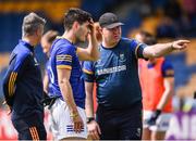 21 May 2022; Wicklow manager Alan Costello gives instructions to Eoin Darcy ahead of the Tailteann Cup Preliminary Round match between Wicklow and Waterford at County Grounds in Aughrim, Wicklow. Photo by Daire Brennan/Sportsfile