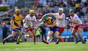 21 May 2022; Conor Coyle of Roscommon in action against Tyrone players, from left, Seán Óg Grogan, CJ McGourty and Aidan Kelly during the Nickey Rackard Cup Final match between Roscommon and Tyrone at Croke Park in Dublin. Photo by Piaras Ó Mídheach/Sportsfile