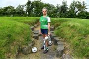 24 May 2022; Róisín Ambrose of Limerick poses for a portrait with the West County Hotel cup at the Knowth megalithic passage-tomb site in County Meath. TG4 has today announced a five-year extension of their sponsorship of the All-Ireland Ladies Football inter-county championships, with the new deal set to last until the conclusion of the 2027 season. The 2022 TG4 All-Ireland Ladies Football Championships get underway next Sunday, May 29, with the first round of Intermediate Fixtures, and will conclude on Sunday, July 31, when the winners of the Junior, Intermediate & Senior Championships will be revealed. 13 Championship games will be broadcast exclusively live by TG4 throughout the season, with the remaining 47 games available to view on the LGFA and TG4’s dedicated online platform: https://page.inplayer.com/lgfaseason2022/tg4.html In addition, the TG4 Leinster Senior Final between Dublin and Meath will also be televised live by TG4 from Croke Park next Saturday, May 28. #ProperFan . Photo by Brendan Moran/Sportsfile