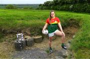 24 May 2022; Clíodhna Ní Shé of Carlow poses for a portrait with the West County Hotel cup at the Knowth megalithic passage-tomb site in County Meath. TG4 has today announced a five-year extension of their sponsorship of the All-Ireland Ladies Football inter-county championships, with the new deal set to last until the conclusion of the 2027 season. The 2022 TG4 All-Ireland Ladies Football Championships get underway next Sunday, May 29, with the first round of Intermediate Fixtures, and will conclude on Sunday, July 31, when the winners of the Junior, Intermediate & Senior Championships will be revealed. 13 Championship games will be broadcast exclusively live by TG4 throughout the season, with the remaining 47 games available to view on the LGFA and TG4’s dedicated online platform: https://page.inplayer.com/lgfaseason2022/tg4.html In addition, the TG4 Leinster Senior Final between Dublin and Meath will also be televised live by TG4 from Croke Park next Saturday, May 28. #ProperFan . Photo by Brendan Moran/Sportsfile