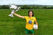 24 May 2022; Susanne White of Donegal poses for a portrait with the Brendan Martin cup at the Knowth megalithic passage-tomb site in County Meath. TG4 has today announced a five-year extension of their sponsorship of the All-Ireland Ladies Football inter-county championships, with the new deal set to last until the conclusion of the 2027 season. The 2022 TG4 All-Ireland Ladies Football Championships get underway next Sunday, May 29, with the first round of Intermediate Fixtures, and will conclude on Sunday, July 31, when the winners of the Junior, Intermediate & Senior Championships will be revealed. 13 Championship games will be broadcast exclusively live by TG4 throughout the season, with the remaining 47 games available to view on the LGFA and TG4’s dedicated online platform: https://page.inplayer.com/lgfaseason2022/tg4.html In addition, the TG4 Leinster Senior Final between Dublin and Meath will also be televised live by TG4 from Croke Park next Saturday, May 28. #ProperFan . Photo by Brendan Moran/Sportsfile