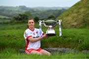 24 May 2022; Niamh O'Neill of Tyrone poses for a portrait with the Mary Quinn memorial cup at the Knowth megalithic passage-tomb site in County Meath. TG4 has today announced a five-year extension of their sponsorship of the All-Ireland Ladies Football inter-county championships, with the new deal set to last until the conclusion of the 2027 season. The 2022 TG4 All-Ireland Ladies Football Championships get underway next Sunday, May 29, with the first round of Intermediate Fixtures, and will conclude on Sunday, July 31, when the winners of the Junior, Intermediate & Senior Championships will be revealed. 13 Championship games will be broadcast exclusively live by TG4 throughout the season, with the remaining 47 games available to view on the LGFA and TG4’s dedicated online platform: https://page.inplayer.com/lgfaseason2022/tg4.html In addition, the TG4 Leinster Senior Final between Dublin and Meath will also be televised live by TG4 from Croke Park next Saturday, May 28. #ProperFan . Photo by Brendan Moran/Sportsfile
