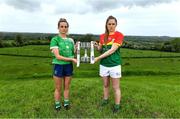 24 May 2022; Róisín Ambrose of Limerick, left, and Clíodhna Ní Shé of Carlow with the West County Hotel cup at the Knowth megalithic passage-tomb site in County Meath. TG4 has today announced a five-year extension of their sponsorship of the All-Ireland Ladies Football inter-county championships, with the new deal set to last until the conclusion of the 2027 season. The 2022 TG4 All-Ireland Ladies Football Championships get underway next Sunday, May 29, with the first round of Intermediate Fixtures, and will conclude on Sunday, July 31, when the winners of the Junior, Intermediate & Senior Championships will be revealed. 13 Championship games will be broadcast exclusively live by TG4 throughout the season, with the remaining 47 games available to view on the LGFA and TG4’s dedicated online platform: https://page.inplayer.com/lgfaseason2022/tg4.html In addition, the TG4 Leinster Senior Final between Dublin and Meath will also be televised live by TG4 from Croke Park next Saturday, May 28. #ProperFan . Photo by Brendan Moran/Sportsfile
