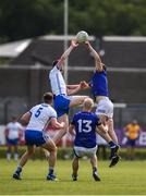 21 May 2022; Jason Curry of Waterford in action against Rory Stokes of Wicklow during the Tailteann Cup Preliminary Round match between Wicklow and Waterford at County Grounds in Aughrim, Wicklow. Photo by Daire Brennan/Sportsfile