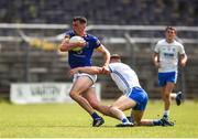 21 May 2022; Pádraig O’Toole of Wicklow in action against Dermot Ryan of Waterford during the Tailteann Cup Preliminary Round match between Wicklow and Waterford at County Grounds in Aughrim, Wicklow. Photo by Daire Brennan/Sportsfile