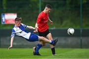 21 May 2022; Nathan O'Kelly of Corduff FC is tackled by Harry Quilligan of College Corinthians AFC during the FAI Centenary Under 17 Cup Final 2021/2022 match between Corduff FC, Dublin, and College Corinthians AFC, Cork, at Home Farm Football Club in Dublin. Photo by Brendan Moran/Sportsfile