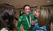 21 May 2022; Lisa O'Rourke of Ireland greeted by her family at Dublin Airport on their return from the IBA Women's World Boxing Championships 2022 in Turkey. Photo by Oliver McVeigh/Sportsfile