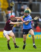 21 May 2022; Tom Monaghan of Galway in action against James Madden of Dublin during the Leinster GAA Hurling Senior Championship Round 5 match between Galway and Dublin at Pearse Stadium in Galway. Photo by Ray Ryan/Sportsfile