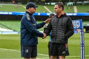 21 May 2022; Leinster backs coach Felipe Contepomi shakes hands with Munster head coach Johann van Graan before the United Rugby Championship match between Leinster and Munster at the Aviva Stadium in Dublin. Photo by Harry Murphy/Sportsfile