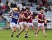 21 May 2022; Aonghus Clarke of Westmeath in action against James Keyes of Laois during the Leinster GAA Hurling Senior Championship Round 5 match between Laois and Westmeath at MW Hire O’Moore Park in Portlaoise, Laois. Photo by Michael P Ryan/Sportsfile