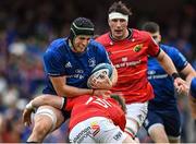 21 May 2022; Ryan Baird of Leinster is tackled by Mike Haley of Munster during the United Rugby Championship match between Leinster and Munster at Aviva Stadium in Dublin. Photo by Brendan Moran/Sportsfile