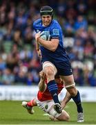 21 May 2022; Ryan Baird of Leinster beats the tackle of Jack O'Donoghue of Munster during the United Rugby Championship match between Leinster and Munster at Aviva Stadium in Dublin. Photo by Brendan Moran/Sportsfile