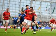 21 May 2022; Niall Scannell of Munster is tackled by Harry Byrne of Leinster during the United Rugby Championship match between Leinster and Munster at the Aviva Stadium in Dublin. Photo by Harry Murphy/Sportsfile
