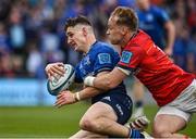 21 May 2022; Cormac Foley of Leinster scores his side's second try despite the tackle of Mike Haley of Munster during the United Rugby Championship match between Leinster and Munster at Aviva Stadium in Dublin. Photo by Brendan Moran/Sportsfile