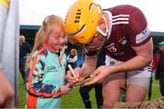 21 May 2022; Nial Mitchell of Westmeath signs an autograph for a young supporter after the Leinster GAA Hurling Senior Championship Round 5 match between Laois and Westmeath at MW Hire O’Moore Park in Portlaoise, Laois. Photo by Michael P Ryan/Sportsfile
