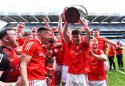 21 May 2022; Louth captain Feidhleim Joyce lifts the cup alongside teammates during the celebrations after their victory in Lory Meagher Cup Final match between Longford and Louth at Croke Park in Dublin. Photo by Piaras Ó Mídheach/Sportsfile