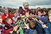 21 May 2022; Darren Morrissey of Galway signs his autograph for young supporters after the Leinster GAA Hurling Senior Championship Round 5 match between Galway and Dublin at Pearse Stadium in Galway. Photo by Ray Ryan/Sportsfile