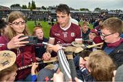 21 May 2022; Conor Cooney of Galway smiles for a selfie with a young supporters after the Leinster GAA Hurling Senior Championship Round 5 match between Galway and Dublin at Pearse Stadium in Galway. Photo by Ray Ryan/Sportsfile