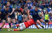 21 May 2022; Ed Byrne of Leinster beats the tackle of Josh Wycherley of Munster during the United Rugby Championship match between Leinster and Munster at Aviva Stadium in Dublin. Photo by Brendan Moran/Sportsfile