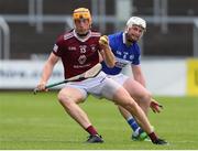 21 May 2022; Nial Mitchell of Westmeath in action against Ciaran McEvoy of Laois during the Leinster GAA Hurling Senior Championship Round 5 match between Laois and Westmeath at MW Hire O’Moore Park in Portlaoise, Laois. Photo by Michael P Ryan/Sportsfile