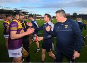 21 May 2022; Wexford manager Darragh Egan and Connal Flood, left, celebrate after the Leinster GAA Hurling Senior Championship Round 5 match between Kilkenny and Wexford at UPMC Nowlan Park in Kilkenny. Photo by Stephen McCarthy/Sportsfile