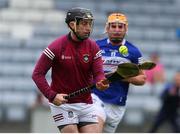 21 May 2022; Westmeath goalkeeper Noel Conaty in action against Charles Dwyer of Laois during the Leinster GAA Hurling Senior Championship Round 5 match between Laois and Westmeath at MW Hire O’Moore Park in Portlaoise, Laois. Photo by Michael P Ryan/Sportsfile