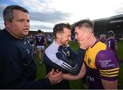 21 May 2022; Charlie McGuckin of Wexford celebrates with Graham Byrne, strength & conditioning coach, and manager Darragh Egan, left, after the Leinster GAA Hurling Senior Championship Round 5 match between Kilkenny and Wexford at UPMC Nowlan Park in Kilkenny. Photo by Stephen McCarthy/Sportsfile