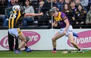 21 May 2022; Diarmuid O'Keeffe of Wexford has his helmet pulled by Cian Kenny of Kilkenny during the Leinster GAA Hurling Senior Championship Round 5 match between Kilkenny and Wexford at UPMC Nowlan Park in Kilkenny. Photo by Stephen McCarthy/Sportsfile