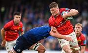 21 May 2022; Jack O'Donoghue of Munster is tackled by Scott Penny of Leinster during the United Rugby Championship match between Leinster and Munster at Aviva Stadium in Dublin. Photo by Brendan Moran/Sportsfile