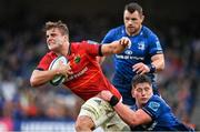 21 May 2022; Alex Kendellen of Munster is tackled by Joe McCarthy of Leinster during the United Rugby Championship match between Leinster and Munster at Aviva Stadium in Dublin. Photo by Brendan Moran/Sportsfile