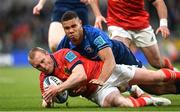 21 May 2022; Keith Earls of Munster is tackled by Adam Byrne of Leinster during the United Rugby Championship match between Leinster and Munster at the Aviva Stadium in Dublin. Photo by Harry Murphy/Sportsfile