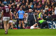 21 May 2022; David Burke of Galway receives medical attention during the Leinster GAA Hurling Senior Championship Round 5 match between Galway and Dublin at Pearse Stadium in Galway. Photo by Ray Ryan/Sportsfile
