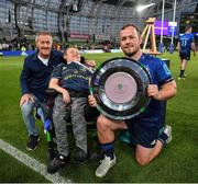 21 May 2022; Leinster captain Ed Byrne with the Irish Shield and Leinster supporters Alan and Matthew McGrath after the United Rugby Championship match between Leinster and Munster at Aviva Stadium in Dublin. Photo by Brendan Moran/Sportsfile