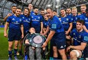 21 May 2022; Leinster captain Ed Byrne is presented with the Irish Shield by Leinster supporter Matthew McGrath after the United Rugby Championship match between Leinster and Munster at Aviva Stadium in Dublin. Photo by Brendan Moran/Sportsfile