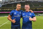 21 May 2022; Adam Byrne and Peter Dooley of Leinster after their side's victory in the United Rugby Championship match between Leinster and Munster at the Aviva Stadium in Dublin. Photo by Harry Murphy/Sportsfile