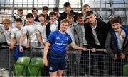 21 May 2022; Ben Murphy of Leinster with students from Presentation College Bray after the United Rugby Championship match between Leinster and Munster at Aviva Stadium in Dublin. Photo by Brendan Moran/Sportsfile