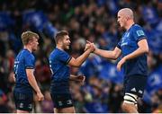 21 May 2022; Leinster players, from right, Devin Toner, Jordan Larmour and Ben Murphy after their side's victory in the United Rugby Championship match between Leinster and Munster at the Aviva Stadium in Dublin. Photo by Harry Murphy/Sportsfile