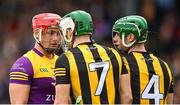 21 May 2022; Lee Chin of Wexford faces up to Paddy Deegan and Tommy Walsh, right, of Kilkenny during the Leinster GAA Hurling Senior Championship Round 5 match between Kilkenny and Wexford at UPMC Nowlan Park in Kilkenny. Photo by Stephen McCarthy/Sportsfile