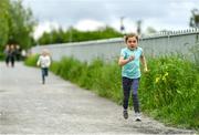 22 May 2022; parkrun Ireland in partnership with Vhi, added a new junior parkrun at Lusk Sports Hub in Lusk, Dublin, on Sunday 22nd of May. Junior park runs take place over a 2km course weekly, and are a free and friendly event for 4-14 year olds, providing a fun and safe environment to enjoy exercise. To register for a junior parkrun near you visit www.parkrun.ie. Pictured is a participant during the parkrun. Photo by Ben McShane/Sportsfile