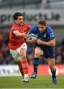 21 May 2022; Jordan Larmour of Leinster is tackled by Joey Carbery of Munster during the United Rugby Championship match between Leinster and Munster at the Aviva Stadium in Dublin. Photo by Harry Murphy/Sportsfile