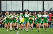 22 May 2022; Offaly captain Ella Cuskelly leads her side out before the 2022 All-Ireland U14 Bronze Final between Derry and Offaly at the GAA National Games Development Centre in Abbotstown, Dublin. Photo by Ben McShane/Sportsfile