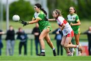 22 May 2022; Ella Cuskelly of Offaly in action against Áine Young of Derry during the 2022 All-Ireland U14 Bronze Final between Derry and Offaly at the GAA National Games Development Centre in Abbotstown, Dublin. Photo by Ben McShane/Sportsfile