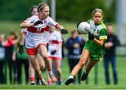 22 May 2022; Ava Kenny of Offaly in action against Áine Young of Derry during the 2022 All-Ireland U14 Bronze Final between Derry and Offaly at the GAA National Games Development Centre in Abbotstown, Dublin. Photo by Ben McShane/Sportsfile