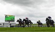 22 May 2022; Zarinsk, with Colin Keane up, 14, cross the line ahead of Never Ending Story, with Ryan Moore up, to win the Tally Ho Stud Irish EBF Fillies Maiden during the Tattersalls Irish Guineas Festival at The Curragh Racecourse in Kildare. Photo by Harry Murphy/Sportsfile