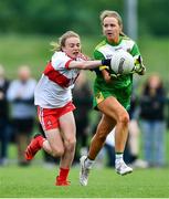 22 May 2022; Anna Dempsey of Offaly in action against Brooke Harbinson of Derry during the 2022 All-Ireland U14 Bronze Final between Derry and Offaly at the GAA National Games Development Centre in Abbotstown, Dublin. Photo by Ben McShane/Sportsfile