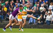 22 May 2022; Anton Sullivan of Offaly in action against Gavin Sheehan of Wexford during the Tailteann Cup Preliminary Round match between Wexford and Offaly at Bellefield in Enniscorthy, Wexford. Photo by Brendan Moran/Sportsfile