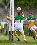 22 May 2022; Offaly goalkeeper Paddy Dunican fails to save an effort from Niall Hughes of Wexford for Wexford's second goal during the Tailteann Cup Preliminary Round match between Wexford and Offaly at Bellefield in Enniscorthy, Wexford. Photo by Brendan Moran/Sportsfile