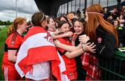 22 May 2022; Derry goalkeeper Sophie Peoples celebrates with her friends after the 2022 All-Ireland U14 Bronze Final between Derry and Offaly at the GAA National Games Development Centre in Abbotstown, Dublin. Photo by Ben McShane/Sportsfile