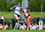 22 May 2022; Ruby Browne of Waterford has her shot blocked by Erin Daly of Tyrone during the 2022 All-Ireland U14 Silver Final between Tyrone and Waterford at the GAA National Games Development Centre in Abbotstown, Dublin. Photo by Ben McShane/Sportsfile
