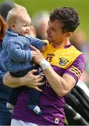 22 May 2022; Ben Brosnan of Wexford with his son Teddy after the Tailteann Cup Preliminary Round match between Wexford and Offaly at Bellefield in Enniscorthy, Wexford. Photo by Brendan Moran/Sportsfile